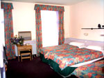 A triple room at Marble Arch Inn