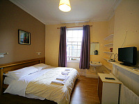 A twin room at Eaton House Hotel